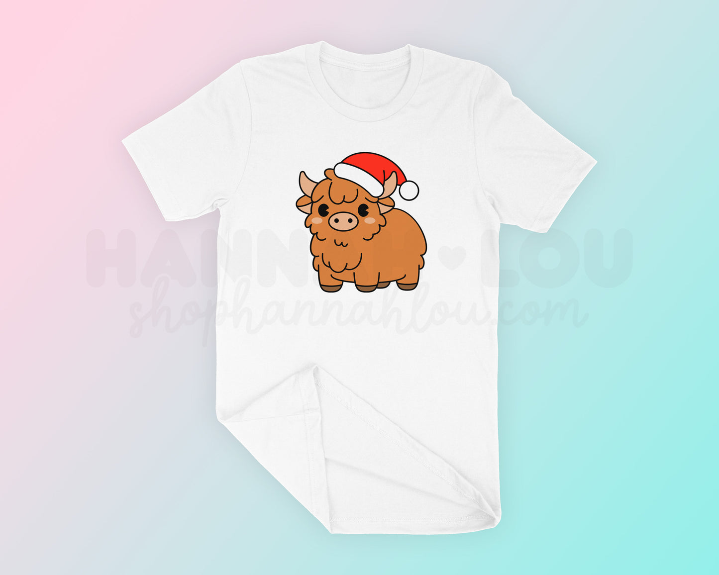 My cute Christmas Highland Cow SVG is part of my Christmas SVG files for Cricut collection, and features an adorable highland cow wearing a Santa hat on a t-shirt.