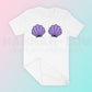 My free Clam Shell PNG is part of my Free Beach Sublimation Designs collection, and features a two clam shells on a t-shirt in the style of a mermaid's bra.