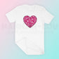 My free Heart Disco Ball SVG is part of my Free Retro SVG Files for Cricut collection, and features a pink heart-shaped disco ball on a t-shirt.